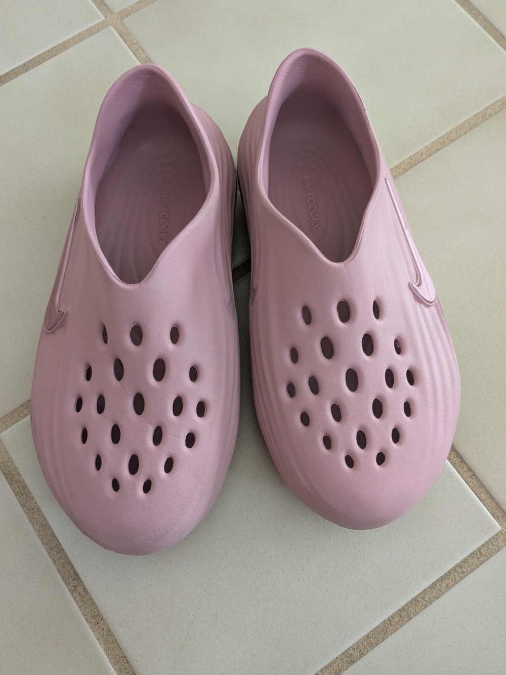 Nike pink ReactX Rejuven8 Slip-On - Women's 6